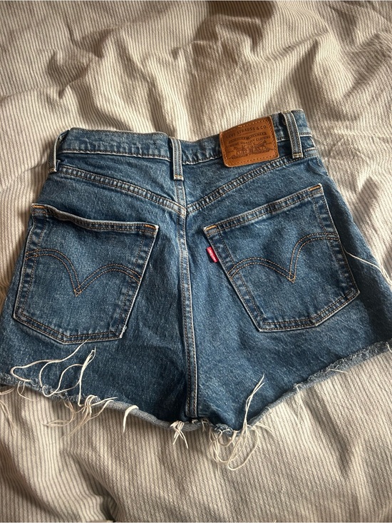 Levi's Pants - Levi's Medium Blue Denim Cutoff Shorts with Raw Hem